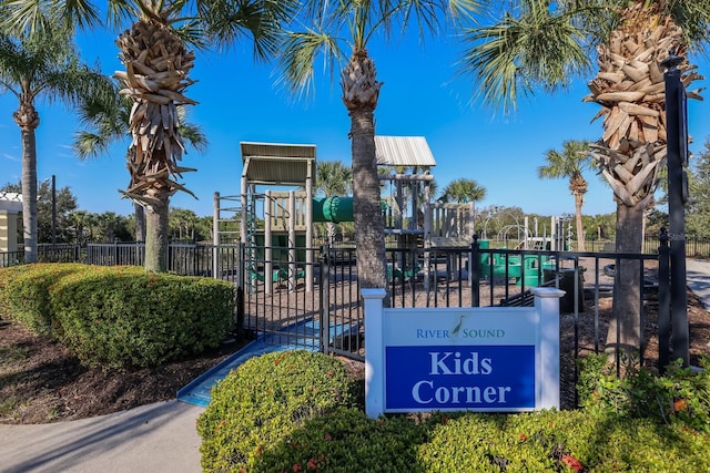 exterior space featuring fence and playground community
