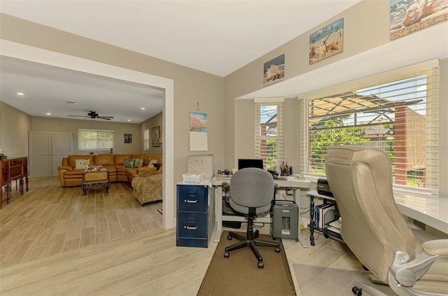 home office featuring light wood-type flooring, recessed lighting, and ceiling fan