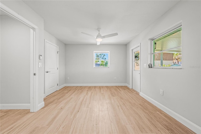 1680 Lemon Bay Dr, Venice, FL 34293 - unfurnished room featuring light wood-style floors, baseboards, and a ceiling fan
