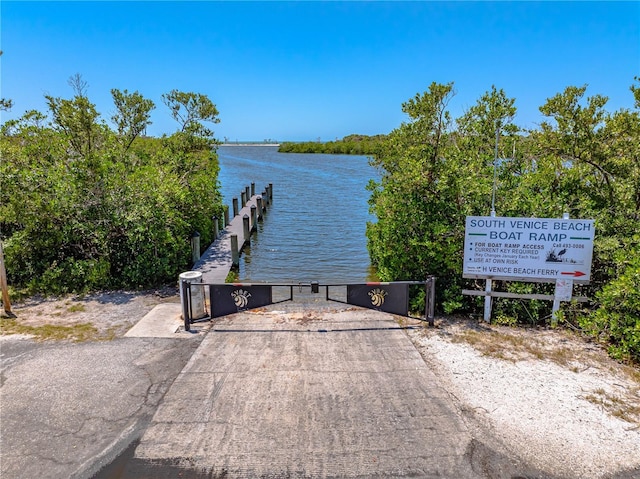 1680 Lemon Bay Dr, Venice, FL 34293 - dock area featuring a water view and a boat ramp