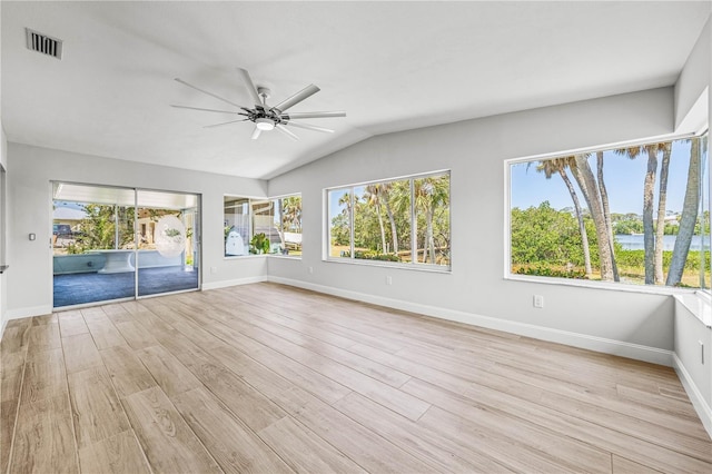 1680 Lemon Bay Dr, Venice, FL 34293 - unfurnished room featuring ceiling fan, light wood-style floors, lofted ceiling, and baseboards