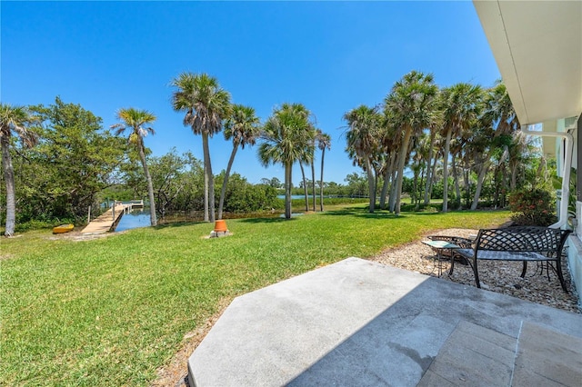 1680 Lemon Bay Dr, Venice, FL 34293 - view of grassy yard with a patio