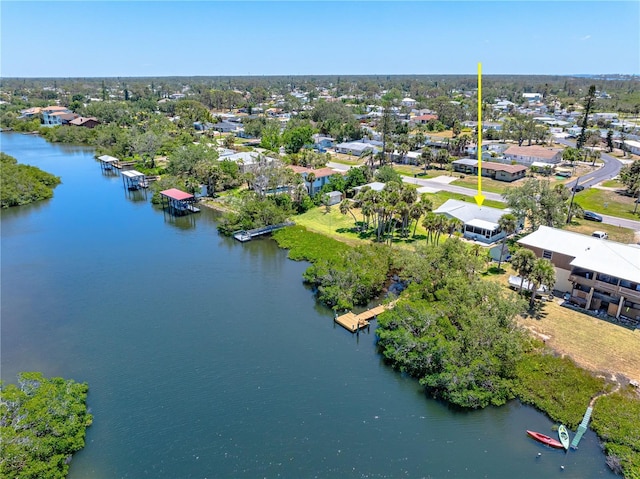 1680 Lemon Bay Dr, Venice, FL 34293 - aerial perspective of suburban area with a large body of water and a tree filled landscape