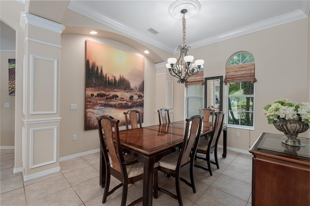 dining room featuring visible vents, ornamental molding, a notable chandelier, and a healthy amount of sunlight