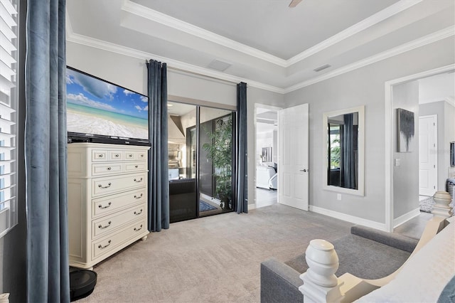interior space with crown molding, a tray ceiling, and light carpet
