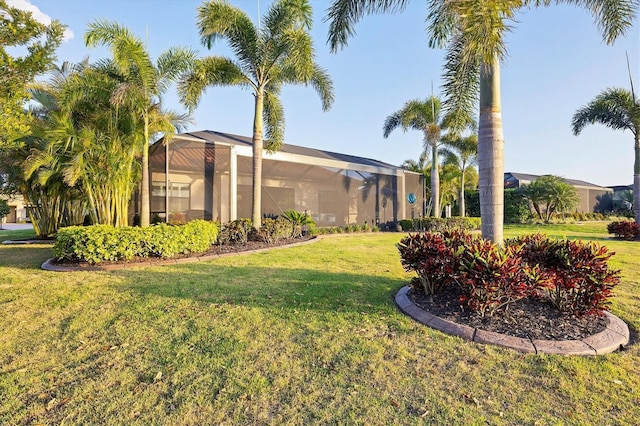 view of yard featuring a lanai