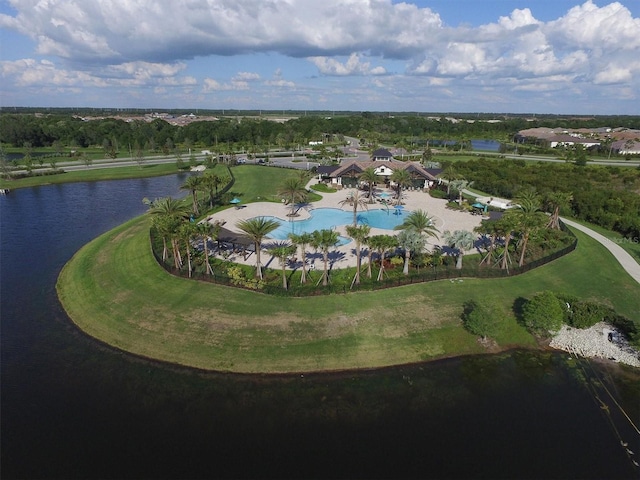 birds eye view of property with a water view