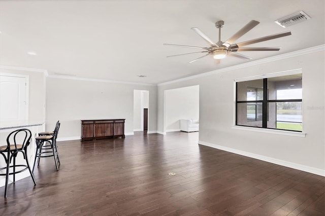 unfurnished living room featuring visible vents, crown molding, baseboards, and ceiling fan
