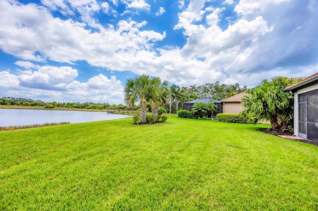 view of yard with a water view