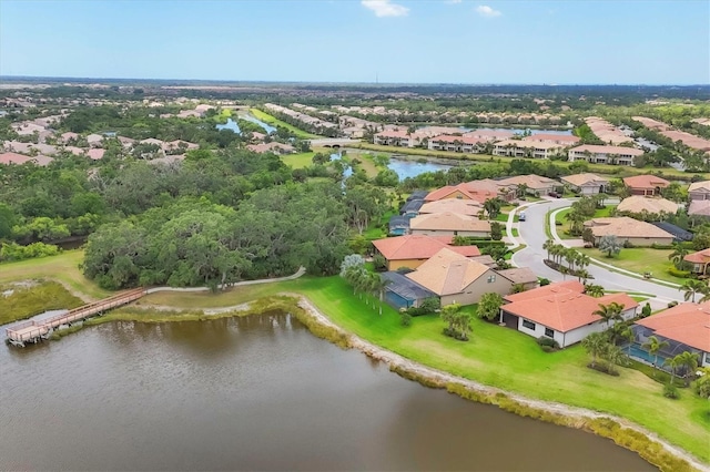 aerial view featuring a residential view and a water view