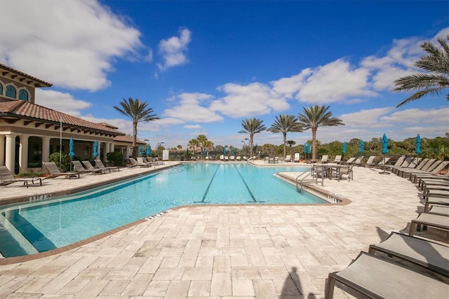 pool with a patio