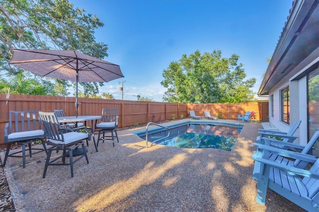 2301 Cass St, Sarasota, FL 34231 - view of pool with a patio, a fenced backyard, a fenced in pool, and outdoor dining space