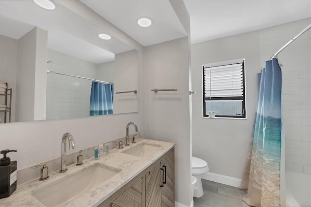 2301 Cass St, Sarasota, FL 34231 - full bathroom with a sink, tile patterned floors, toilet, and double vanity