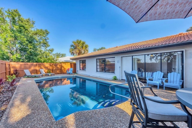2301 Cass St, Sarasota, FL 34231 - view of swimming pool with a fenced backyard, a fenced in pool, and a patio area