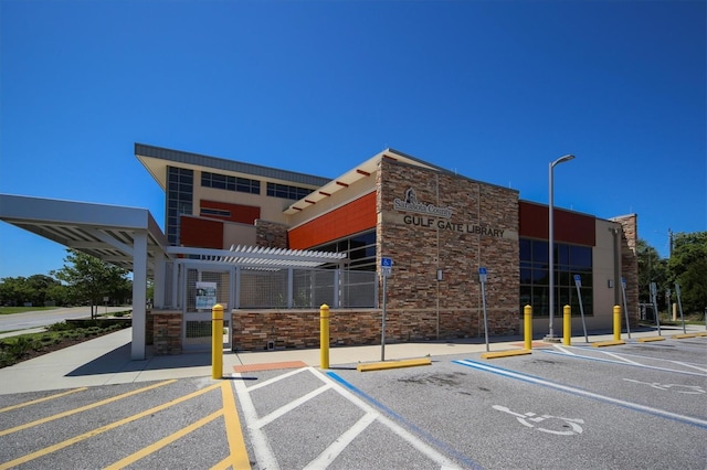 2301 Cass St, Sarasota, FL 34231 - view of property featuring uncovered parking