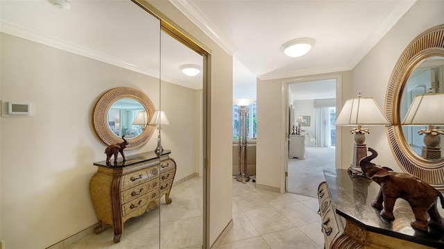 1212 Benjamin Franklin Dr Unit 503, Sarasota, FL 34236 - corridor featuring light tile patterned floors, baseboards, and ornamental molding