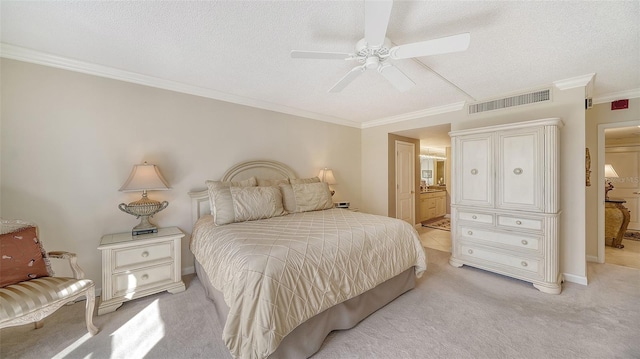 1212 Benjamin Franklin Dr Unit 503, Sarasota, FL 34236 - bedroom featuring connected bathroom, light colored carpet, a textured ceiling, visible vents, and ornamental molding
