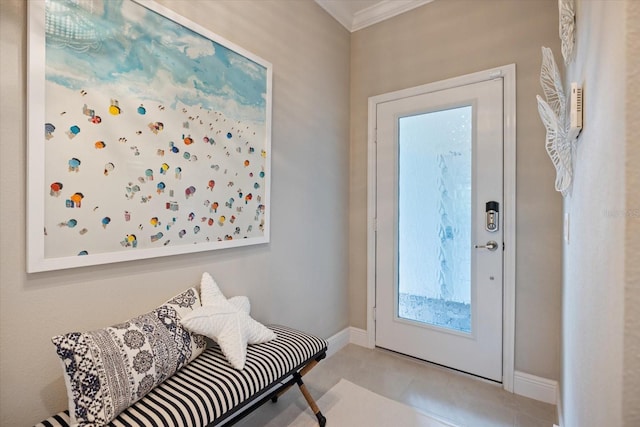 doorway to outside with baseboards and ornamental molding