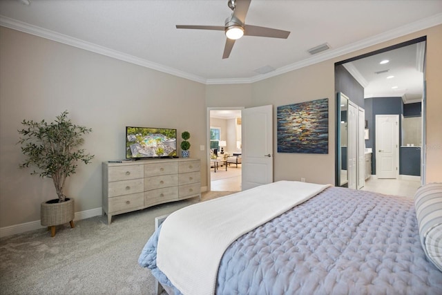 carpeted bedroom featuring crown molding, baseboards, connected bathroom, and visible vents