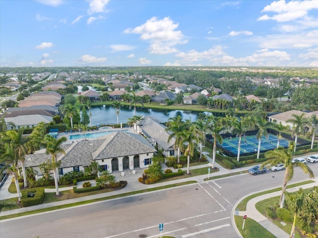 birds eye view of property with a residential view