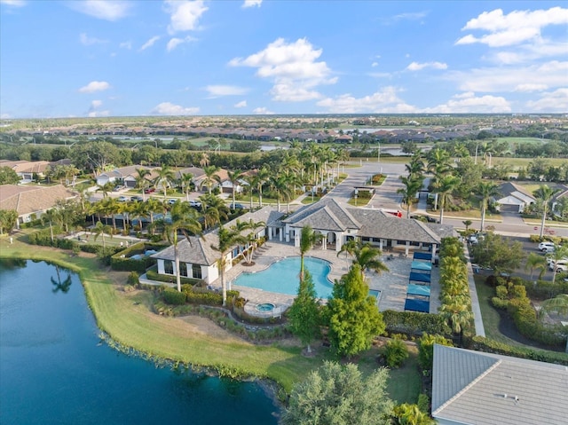 bird's eye view featuring a water view and a residential view