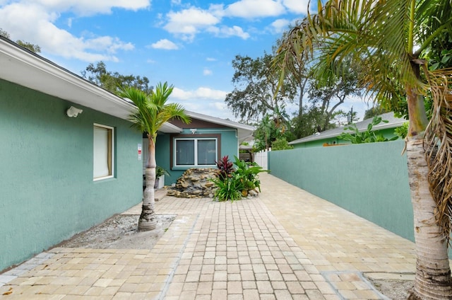 view of patio / terrace featuring fence