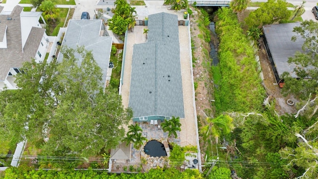 birds eye view of property with a residential view