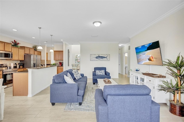living room with crown molding and recessed lighting