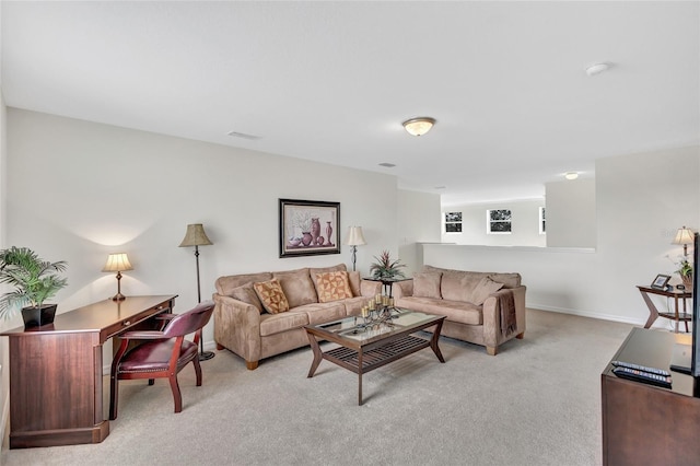 living room with light colored carpet