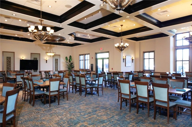 dining area with carpet floors, a notable chandelier, and coffered ceiling