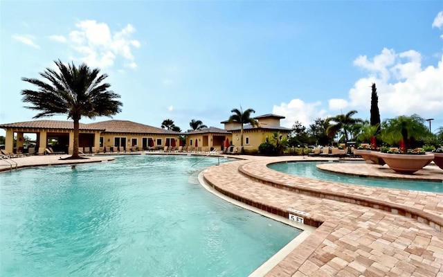 community pool featuring a patio