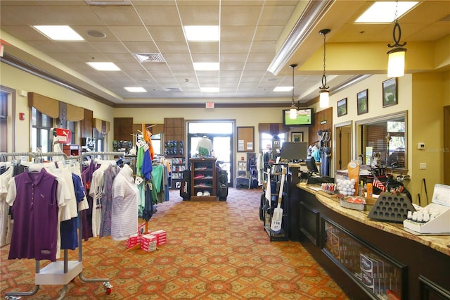 miscellaneous room featuring carpet floors, visible vents, and a paneled ceiling