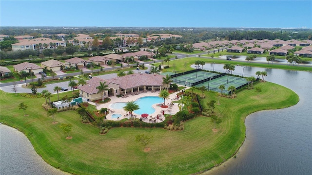 aerial view featuring a water view and a residential view