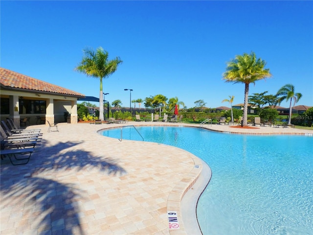 pool with a patio area