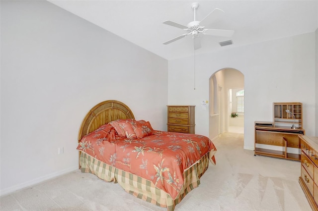 4730 Old Farm Rd, Sarasota, FL 34233 - bedroom featuring visible vents, light carpet, baseboards, ceiling fan, and arched walkways