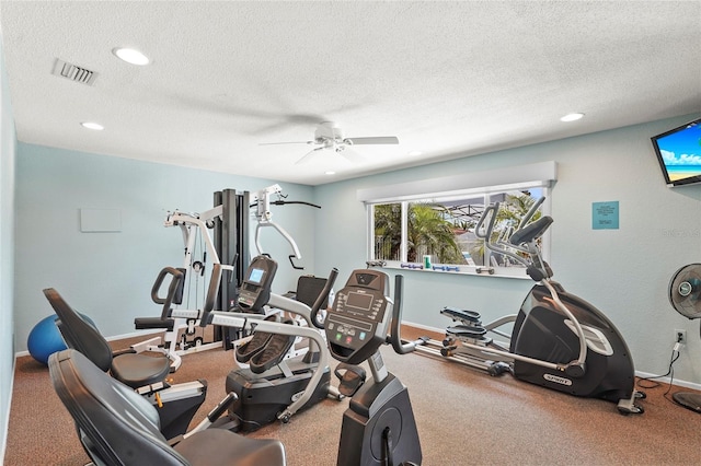 workout area featuring ceiling fan, a textured ceiling, recessed lighting, baseboards, and visible vents