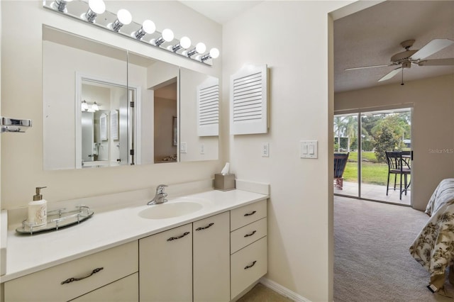 bathroom featuring vanity and ceiling fan