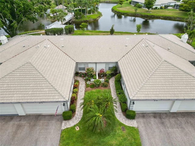 bird's eye view with a water view