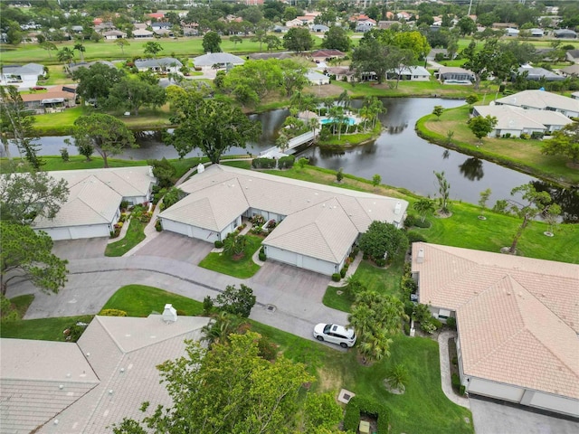 aerial view featuring a water view and a residential view