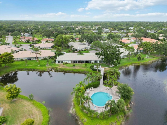 aerial view featuring a water view and a residential view