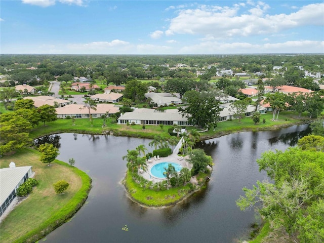 birds eye view of property with a residential view and a water view