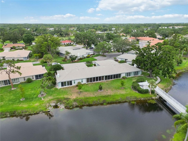 aerial view featuring a water view and a residential view