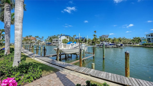 975 Whitakers Ln, Sarasota, FL 34236 - dock featuring boat lift and a water view