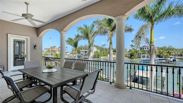 975 Whitakers Ln, Sarasota, FL 34236 - balcony with a ceiling fan, a water view, and outdoor dining area