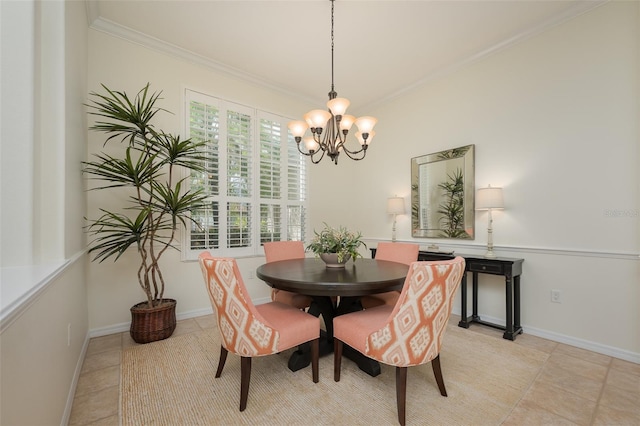 dining area featuring baseboards, a notable chandelier, ornamental molding, and light tile patterned floors