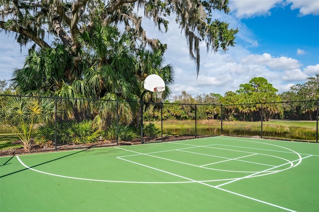 view of sport court with community basketball court and fence