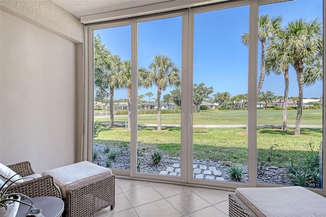 sunroom featuring a healthy amount of sunlight