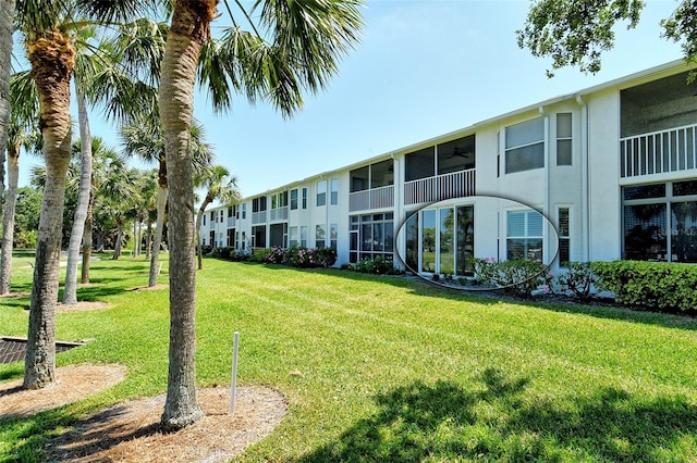 view of community featuring a yard