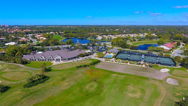 birds eye view of property with a residential view, a water view, and golf course view