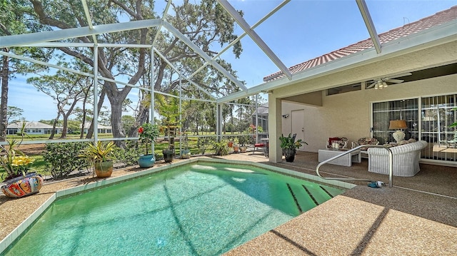 3984 Lyndhurst Ct, Sarasota, FL 34235 - outdoor pool featuring ceiling fan, a patio area, and a lanai